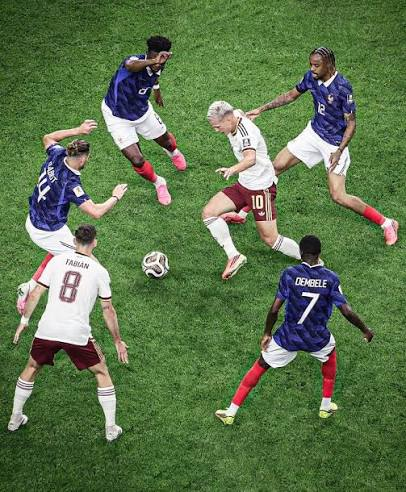 Fabian Ruiz controlling possession against France's midfield